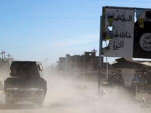 Members of the Iraqi army are seen entering the Ramadi suburbs earlier this month. (AFP/Ahmad Al-Rubaye)