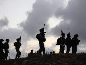 Israeli soldiers stand guard during a tense situation. (Image credit: AFP)