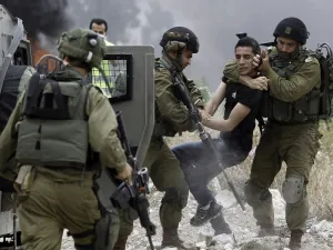 Palestinians were injured late Sunday by ammunition in Bethlehem clashes with Israeli forces. (AFP/Jaafar Ashtiyeh) 