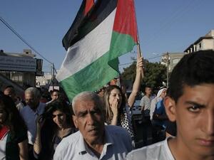 Israeli Arabs march during a demonstration to protest against the demolition of houses by Israeli authorities on June 15, 2015, in the town of Kfar Kana in northern Israel. (AFP/Ahmad Gharabli)