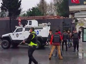 Riot police patrol outside a police station in the Bayrampasha district of Istanbul after two militants launched an attack on the building. (Twitter/Mete Sohtaoglu)