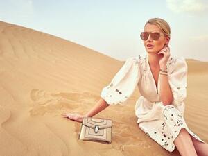 While in Dubai, Lady Kitty Spencer took to the desert where she posed for photos in a cinched-at-the-waist white dress by Australian fashion house Zimmermann. (Source: kitty.spencer - Instagram)