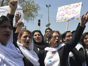 Pakistani lawyers shout slogans as they march during a protest against a suicide bomb attack which killed more than 70 people in Lahore on March 29, 2016. (AFP/Arif Ali)