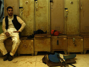A jockey sits in the locker rooms at the end of a race at Beirut's hippodrome. (AFP/file)