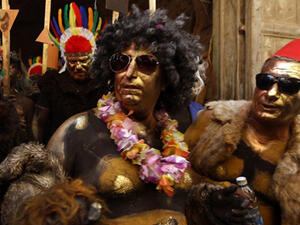 Revelers take part in the Zambo carnival held in the northern Lebanese city of Tripoli to mark the last period of excess on the eve of the Christian Greek Orthodox lent. (AFP/File)