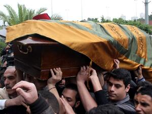 Relatives and friends carry the coffin of 16-year-old Lebanese Mohammad al-Chaar, who died in a bomb attack that killed former Lebanese finance minister Mohammad Chatah. [AFP]