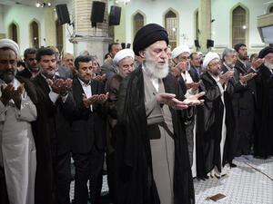  A handout picture released by the official website of the Iranian supreme leader Ayatollah Ali Khamenei shows him leading the night prayers (AFP/HO/KHAMENEI.IR)