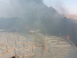 الوطنية الليبية قالت إن النيران اشتعلت جراء هجوم مسلح على الخزان 