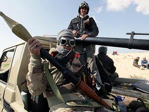 Libyan rebels on the road between Ajdabiya and Benghazi. (AFP/File)