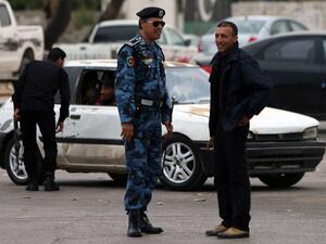Libyan security forces monitor a protest in Benghazi. (AFP/Abdullah Doma)