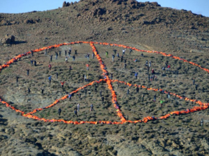 Over 100 charity workers created the symbol as a message of hope for 2016. (Twitter)