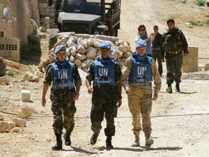 UN observers in Madaya, 2012 (AFP / Loai Beshara)