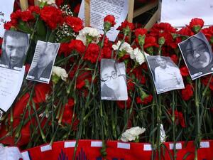 Flowers and photos are displayed in remembrance of the victims of the attack on March 17, 2016 in Ankara, on the site of the blast that killed 35 people on March 13. (AFP/Adem Altan)