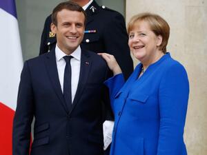 French President Emmanuel Macron (L) and German Chancellor Angela Merkel. (AFP/ File)