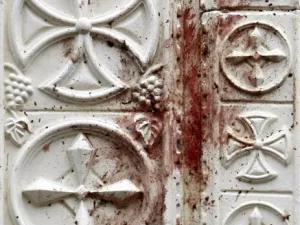 Blood-stains cover the door of the Al-Qiddissine (The Saints) church following an overnight car bomb attack that targeted the church in the Egyptian port city of Alexandria on January 1, 2011 and killed at least 21, hitting Egypt's Christian community, the biggest in the Middle East.