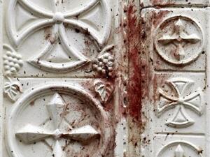 Blood-stains cover the door of the Al-Qiddissine (The Saints) church following an overnight car bomb attack that targeted the church in the Egyptian port city of Alexandria on January 1, 2011 and killed at least 21, hitting Egypt's Christian community, the biggest in the Middle East.