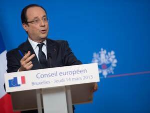 French President Francois Hollande attends a press conference at the EU Headquarters on Thursday in Brussels. (AFP PHOTO / BERTRAND LANGLOIS)