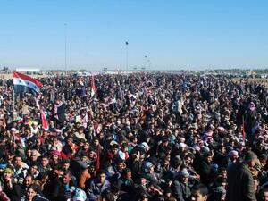 Iraqi protestors call for the release of prisoners they allege were arrested on sectarian grounds by Iraq's Shiite-led authorities during a demonstration in Ramadi, Anbar's provincial capital, on Friday. (AFP)