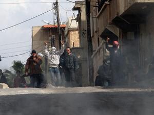Anti-government protestors gesture on the streets of Dera'a, 100kms south of the capital Damascus. (AFP PHOTO/ANWAR AMRO)