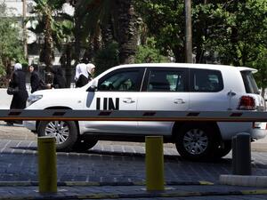 The UN chemical weapons investigation team arrives in Damascus on August 18, 2013. (AFP)