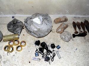 A handout picture released by the Syrian Arab News Agency (SANA) on August 24, 2013 shows bags of what the Syrian government claims to be materials used to make chemical weapons discovered in Jobar on the outskirts of the capital Damascus. (AFP)