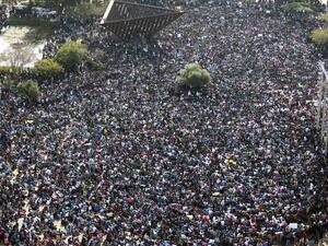 Tens of thousands of African asylum seekers hold a demonstration in Tel Aviv on January 5, 2014. [AFP]