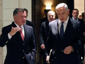 A handout picture released by the Jordanian Royal Palace on January 16, 2014 shows King Abdullah II (L) walking alongside Israeli Prime Minister Benjamin Netanyahu during their meeting in Amman on January 16, 2014. [AFP]