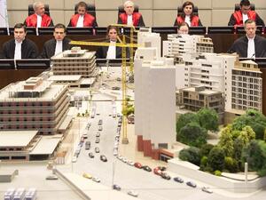 Four Hezbollah members went on trial in absentia at a UN-backed tribunal accused of murdering Hariri in a 2005 car bombing, with sectarian tensions running high at home. [AFP]