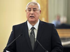 Interim President of Egypt, Adly Mansour, makes statements to the press. [AFP]