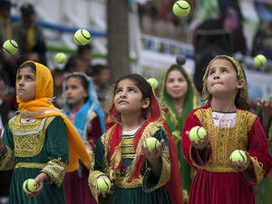 Children work a juggling act