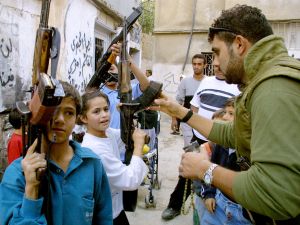 Girls as young as seven are in the training centres where Gaddafi is training up teenage boys and girls to take up arms against the 'crusader' enemy