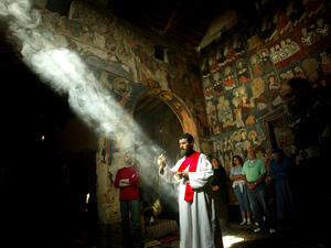 How do Christians view Assad's regime?