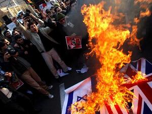 Angry protestors in Tehran stormed the British embassy two years ago causing the two countries to sever ties (Getty)