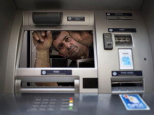 Many visually impaired people believe banks could partially ease their situation if they provided ATMs with electronic sounds.