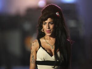 Amy Winehouse, a musical talent of today's generation, is dead at 27. She spent her artistic life drowning in the
the sordid world of drugs & alcohol abuse, but left us some class act hits and albums as her young legacy.
