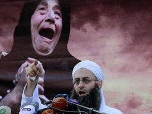 Radical Lebanese sheikh Ahmad al-Assir addresses supporters during a protest against the Syrian regime, in Beirut on October 14, 2012. (AFP/Anwar Amro)
