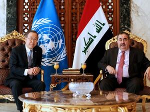 Iraqi Foreign Minister Hoshyar Zebari (R) greets United Nations Secretary-General Ban Ki-moon at Baghdad airport on January 13, 2014, upon the latter's arrival for a two-day visit to Iraq. (AFP)