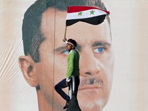 Syria is still at the mercy of "kidnapper" Bashar Al-Assad. (Image source: "blogs.voanews.com")