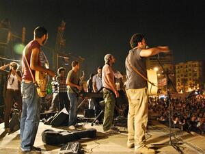 Egyptian rock ban Cairokee playing live at Tahrir Square. (Image source: "intercultural-labratory.blogspot.com")