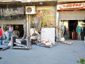 A SANA handout picture shows the devastation in the Christian suburb of Qassaa in Damascus after mortar rounds killed eight people in the capital on Sunday. (AFP/SANA)