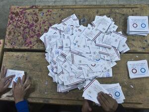 The announcement that the new Egyptian constitution was approved by  98.1 percent of voters has raised some eyebrows. (AFP)