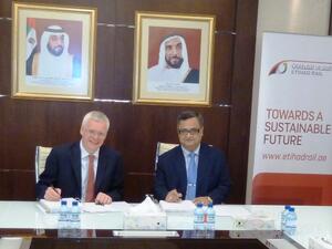 CEO of Etihad Rail signing the agreement with PCM Strescon CEO