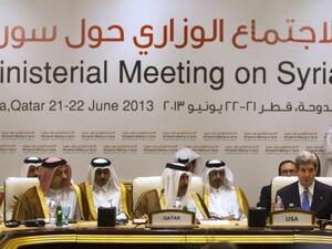  Qatari acting minister of business and trade, and Qatari Prime Minister and Foreign Minister Hamad bin Jassim bin Jaber al-Thani, listen as U.S. Secretary of State John Kerry as he speaks during a Friends of Syria meeting in Doha on Saturday. (AFP)