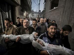 The bodies of two Palestinian children get carried to the mosque by family members. This shot won Paul Hansen the 2012 World Press Photo award. Source: Tumblr.