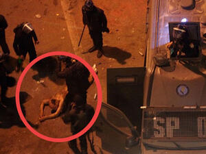 Stripped naked and beaten-- where are the police? They are the ones administering the blows.
