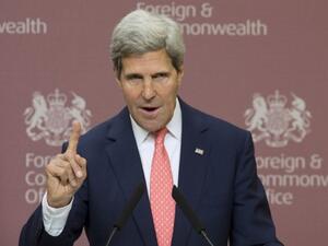 US secretary of State John Kerry addresses a news conference in London. Kerry made a gaffe about Syria handing over their chemical weapons stockpiles, which could inadvertently lead to a breakthrough in the peace talks. (AFP)