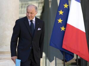 France's Foreign Affairs minister, Laurent Fabius leaves the Elysee Palace after the weekly cabinet meeting, on August 21, 2013 in Paris. (AFP)