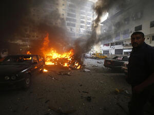 Residents gather at the site of an explosion in Beirut's southern suburb neighbourhood of Bir al-Abed on July 9, 2013. (Source AFP/STR)