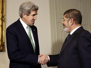 US Secretary of State John Kerry meets the Egyptian President Mohammed Morsi in March (AFP Photo)