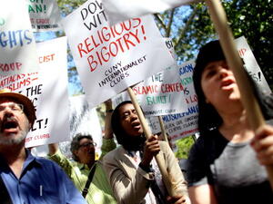 SEPTEMBER 11: Protesters attend a pro-mosque rally near the proposed mosque near the World Trade Center site on September 11, 2010 in New York City
